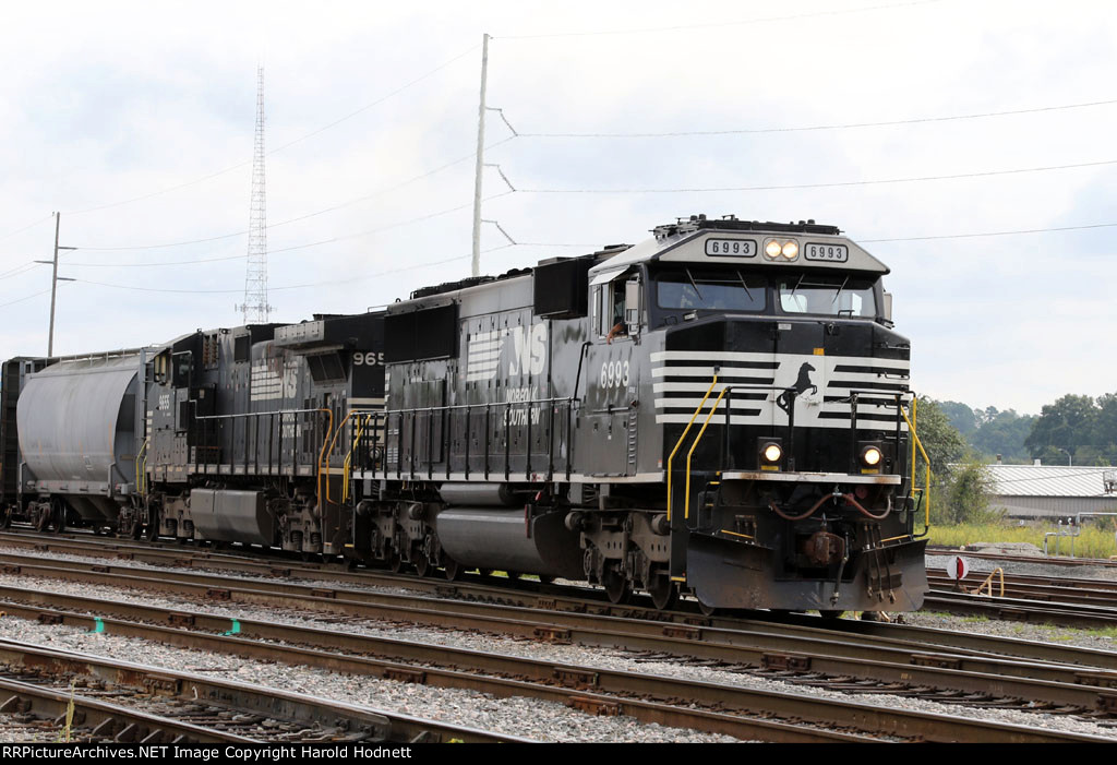 NS 6993 prepares to lead train E25 out of the yard